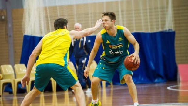 Star turn: Matthew Dellavedova, pictured here training in Canberra last month, was a standout for the Boomers in their tight win over France.