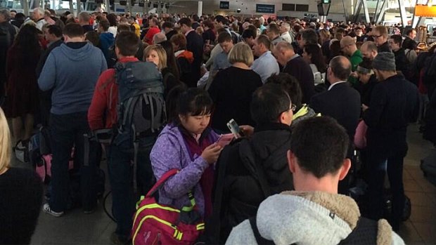 Crowds at Sydney Airport on Friday after a power outage. 