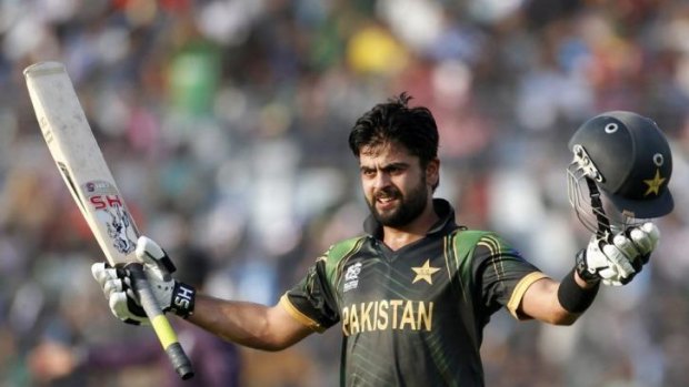 Pakistan's Ahmed Shehzad celebrates after reaching his hundred against Bangladesh during the World Twenty20 match at in Dhaka on Sunday.