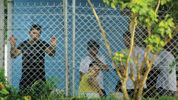 Immigration minister Scott Morrison has been unable to say categorically that non-protesting detainees were not caught up in the violence.