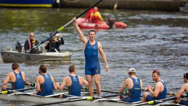 The Melbourne men's crew celebrate their win.