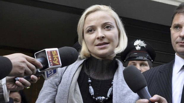 Domnica Cemortan leaves court after testifying that she was on the bridge of the Costa Concordia with Captain Francesco Schettino when it crashed, killing 32 people.