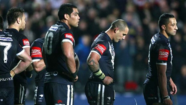 Kiwis crash: A dejected New Zealand after England seal victory in the Four Nations Test.