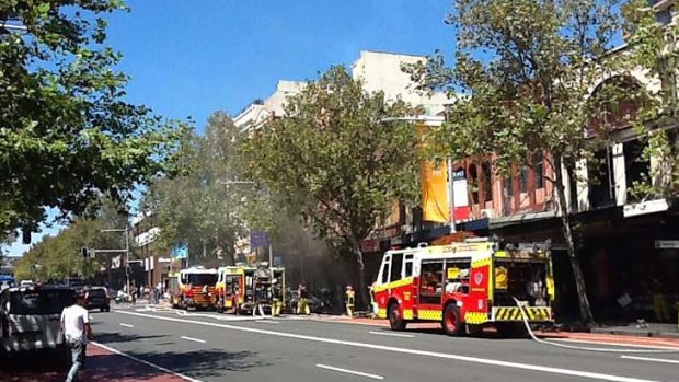 Sex shop fire ... firefighters attend the blaze.