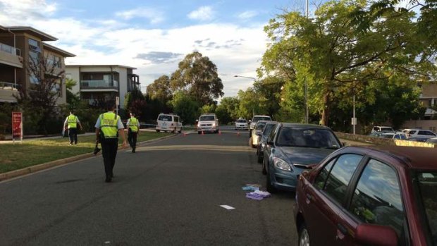 Police at the scene of a serious hit and run in Braddon early Sunday morning.