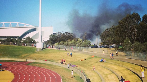 The blaze at Homebush viewed from the athletic track.
