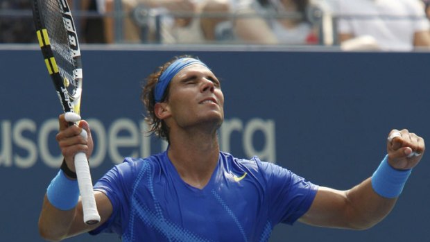 Painful win ... Rafael Nadal celebrates his victory over David Nalbandian.