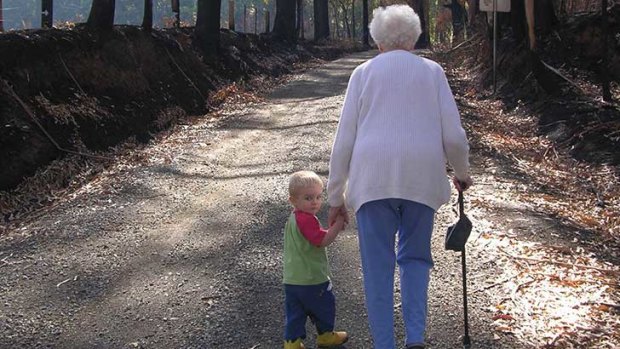 ‘Road to Recovery’, Bonnie Patterson’s poignant and powerful photograph of two-year old son Sam walking hand-in-hand with his great-grandmother Freda Fraser, captures 90-year-old Freda’s willingness to look ahead, Sam’s to look back, and together to move forward on their journey with hope and courage after living through the Black Saturday fires which devastated their hamlet of Castella in 2009.