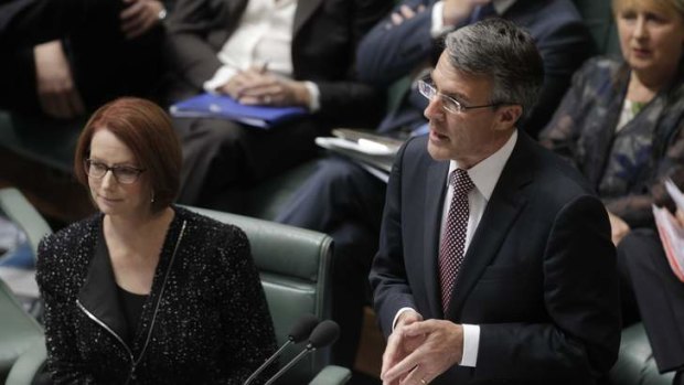 On the case of cyber security... Prime Minister Julia Gillard and new Attorney-General Mark Dreyfus during question time in Parliament House in Canberra on 5 February 2013.