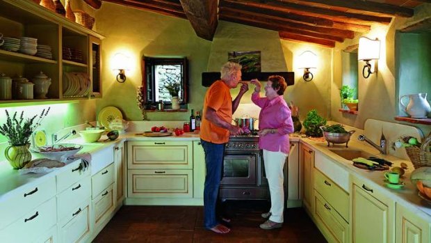 No place like home: Frances Mayes and husband, Ed, in their kitchen in Italy.