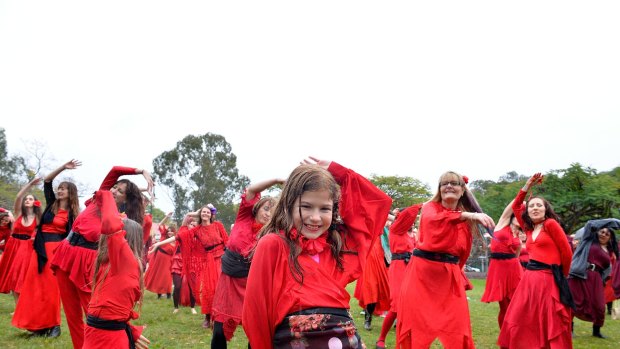 A young girl is seen dancing to Kate Bush's 'Wuthering Heights'.