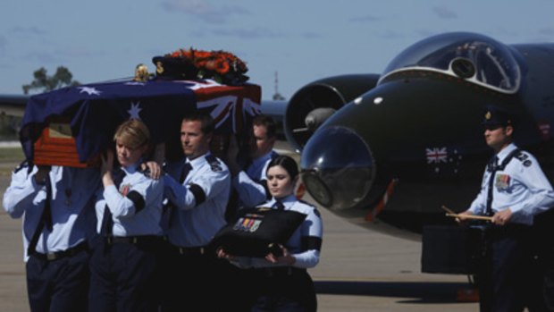 Honour guard... the bodies of Pilot Officer Robert Carver and Flying Officer Michael Herbert, who were missing in Vietnam, were repatriated this week.