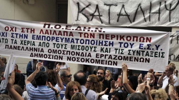 Greek tragedy ... crowds protest against the overrun and under-staffed hospitals in Athens.