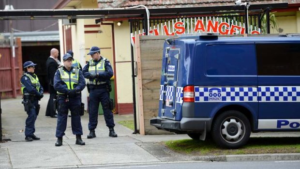 The scene of a police raid on a Hells Angels clubhouse in Alphington.