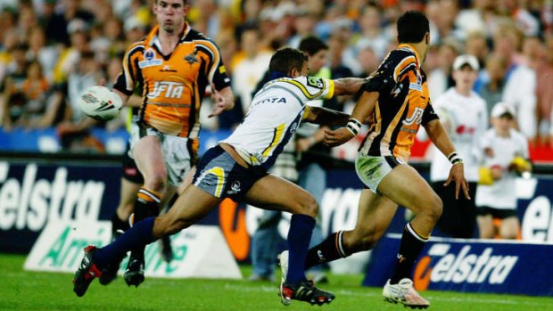 "He played the game differently to anybody we had ever seen play": Marshall's high school coach, Greg Lenton, said his star pupil's decision to quit the Tigers was a sad day for rugby league.