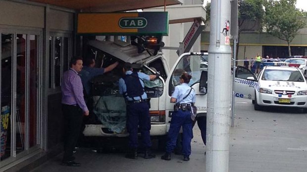 A man has died after being shot while driving in Redfern.