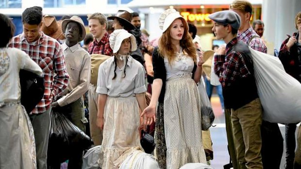 Faithful re-enactment: teenagers in period costume board a train to Ballarat for the 'Mormon migration' pilgrimage.