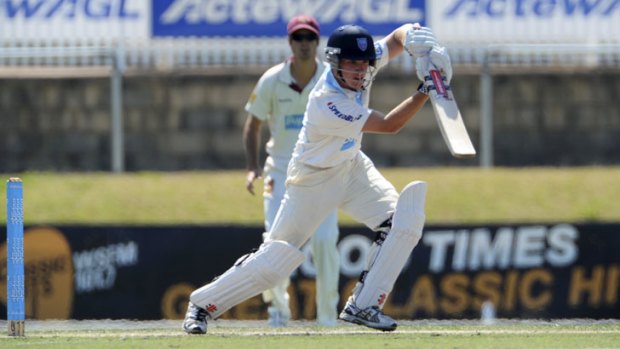 NSW batsman, Adam Zampa in action against the Queensland Bulls on day three at Manuka Oval.