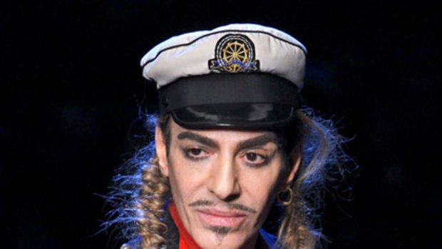 Dior suspends designer Galliano after cafe spat