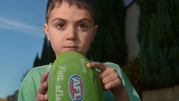 Six year-old Dylan Ferano was pricked by a needle in a Sherrin football at an Auskick event last year.