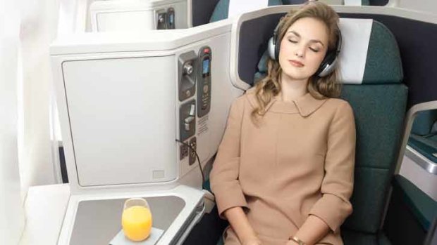 Most airlines don't enforce any sort of dress code for business or first class cabins.