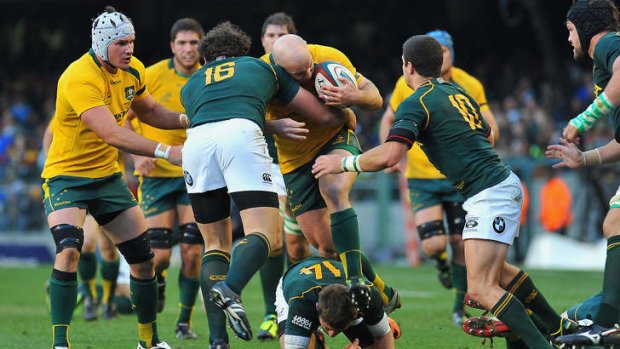 Not going anywhere: much as Stephen Moore's Wallabies found it hard to make ground at the weekend, Ewen McKenzie also had his troops staying put at half-time.