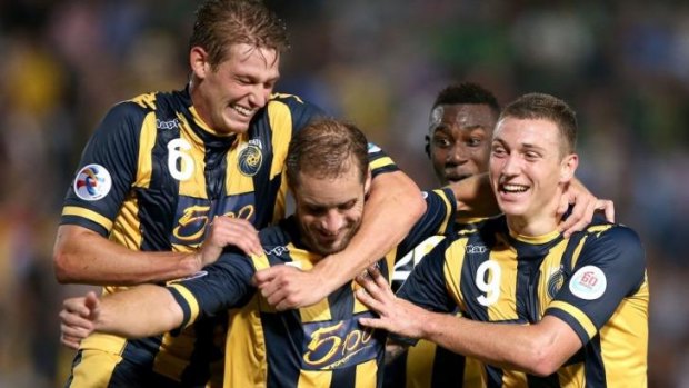 Winner: The Mariners celebrate Marcel Seip's goal on Tuesday night.