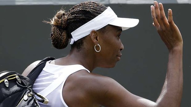 Struggling: Venus Williams after her first-round loss to Elena Vesnina.