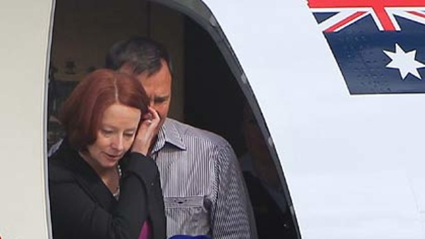 Julia Gillard and her partner Tim Mathieson arrive back in Canberra today.