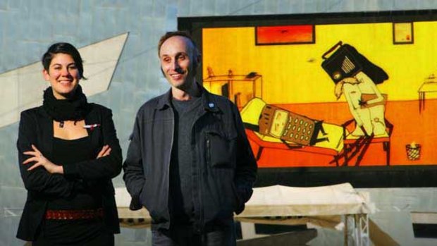 Director Leyla Acaroglu and animator Nick Kallincos with Eric on the big screen at Federation Square.