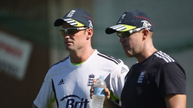England captain Andrew Strauss talks with coach Andy Flower during a nets session.