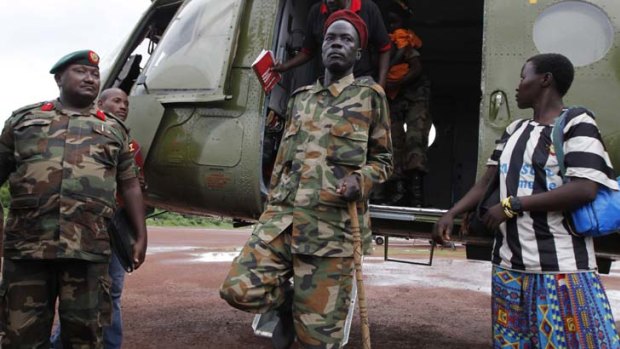 Big fish ... Caesar Acellam, right, the Lord's Resistance Army's fourth in command, after his arrest in the Central African Republic by Ugandan forces at the weekend.