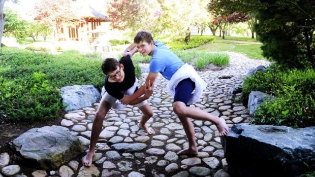 In a bind: Sumo wrestlers Oscar Skrbinsek,13 and Matt Duncan,12 both of Forrest at the Canberra Nara Peace Park.
