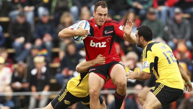 Struggle &#8230; Israel Dagg tries to break through for the Crusaders.