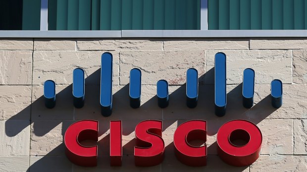 Cisco: The company will cut 5 per cent of its staff despite strong revenue.