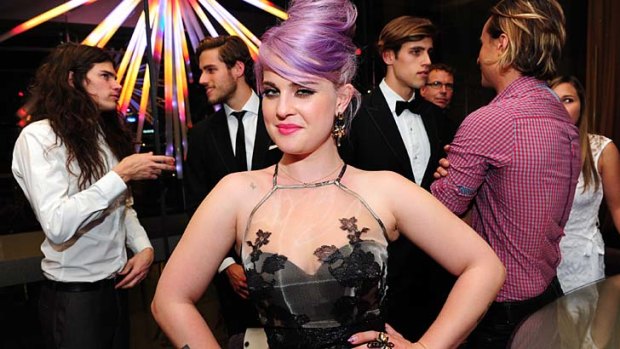 Coming out firing: Kelly Osbourne with (from left) boyfriend Matthew Mosshart, models Zac and Jordan Stenmark, and Oliver Barry.