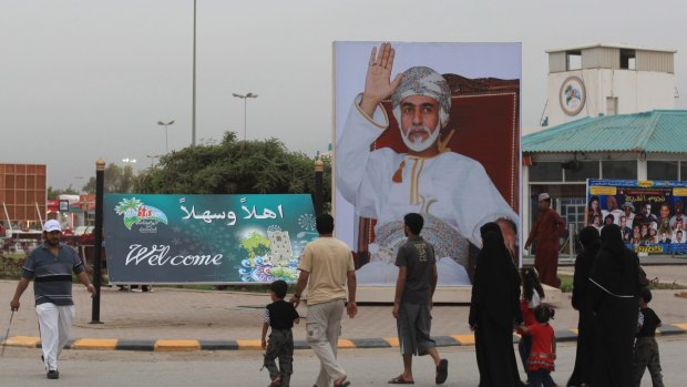 A portrait of Oman's Sultan Qaboos at the entrance to a tourism festival in the southern city of Salalah, near the border with Yemen.