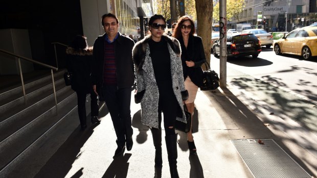 Pankaj Oswal (left) and his wife Radhika (right) and daughter Vasundhara.