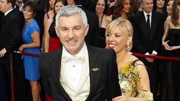 Singing Glee's praises ... Baz Luhrmann and his wife Catherine Martin.