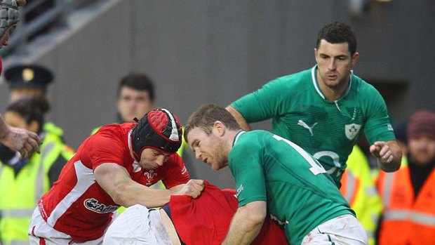 Gordon D'Arcy of Ireland fails to stop George North of Wales scoring a late try.