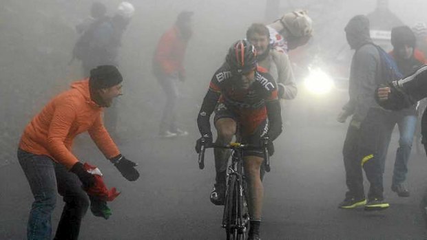 Foggy incline: Cadel Evans lost time to Vincenzo Nibali in the final kilometre of the steep Jafferau climb.