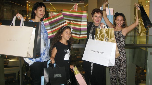 Early bird shoppers sample the wares at the revamped Wintergarden.