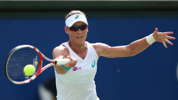 Digging deep: Samantha Stosur competes in the semi-final of the Japan Women's Open. She went on to win the final.
