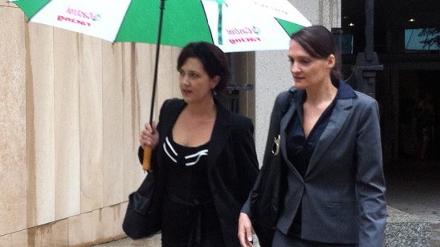 Leonie Vandeven and Kirsty Aitken outside court today, where they have launched legal action against Virgin Australia.