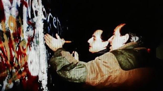 Mr Sarkozy (left) at the wall in 1989.