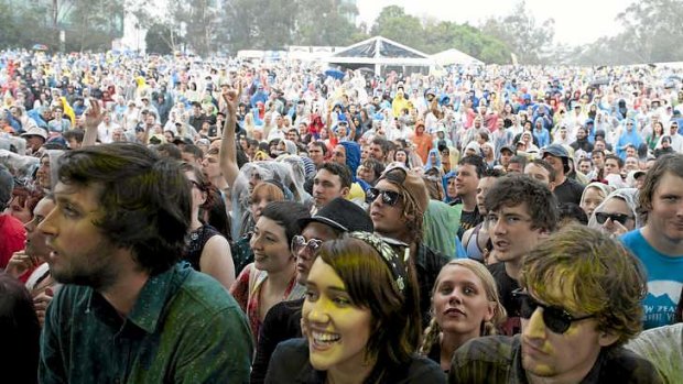 Crowds watch The Dandy Warhols perform at the 2012 Harvest Festival in Brisbane.