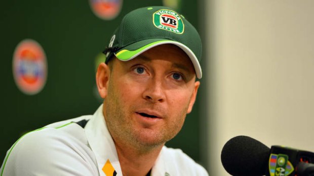 Australian cricket team captain Michael Clarke with a VB logo on his hat.