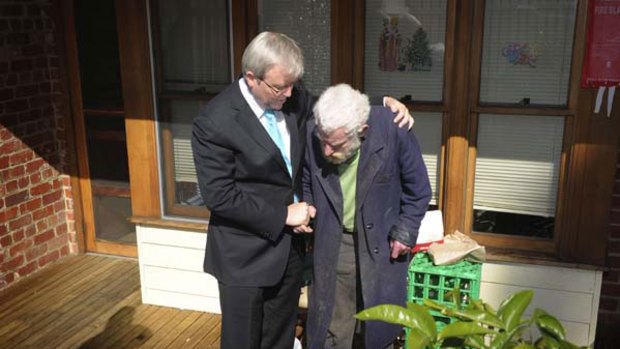 Kevin Rudd with 71-year-old Pat Walsh at a facility for elderly homeless men in Flemington. <i>Picture: Craig Abraham </i>