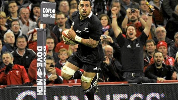 Liam Messam scores a try for New Zealand.