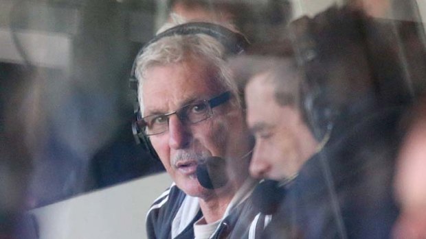 Mick Malthouse in the radio commentary booth during the match between Richmond and Port Adelaide.